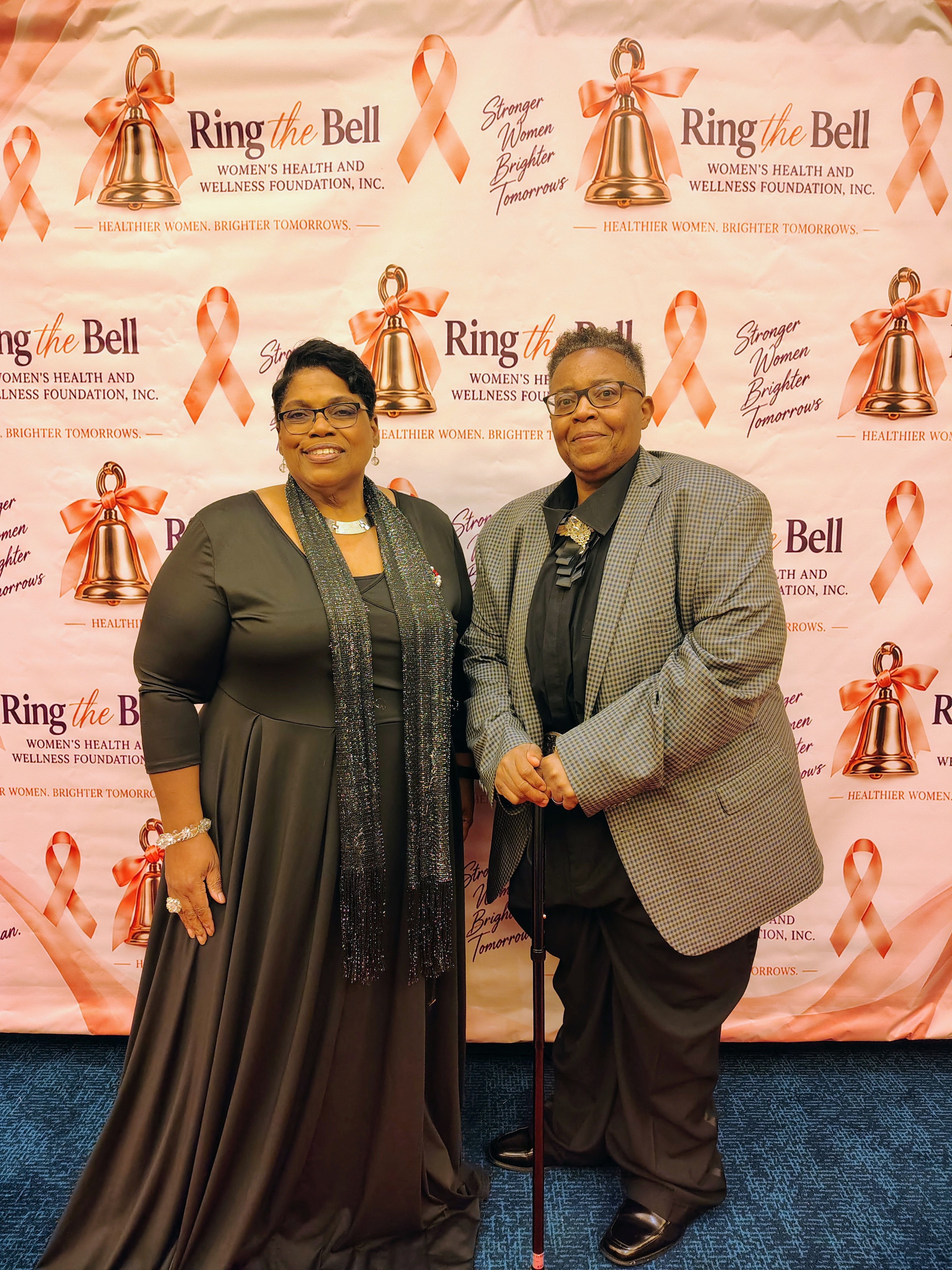 Two women at ring-the-bell charity event